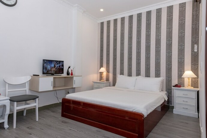 Imagen de la habitación del Hotel The One Ben Thanh. Foto 14