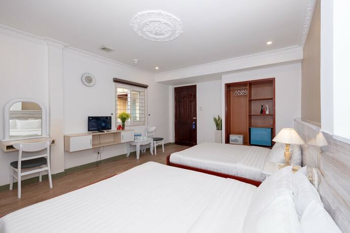 Imagen de la habitación del Hotel The One Ben Thanh. Foto 16