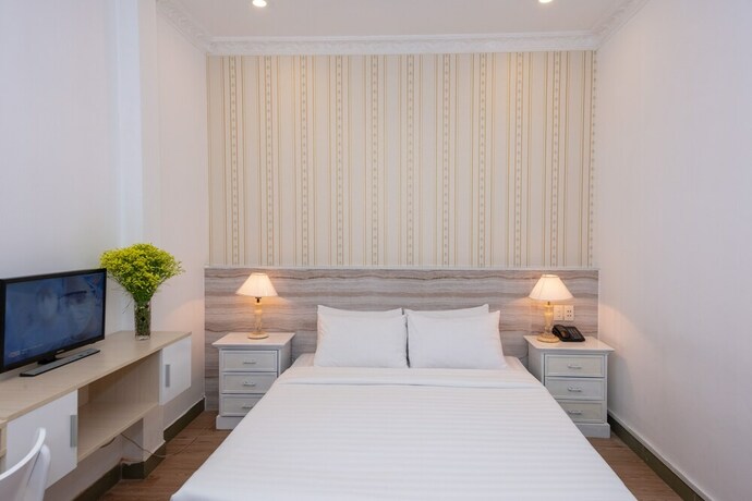 Imagen de la habitación del Hotel The One Ben Thanh. Foto 17