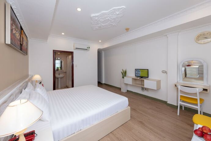 Imagen de la habitación del Hotel The One Ben Thanh. Foto 21