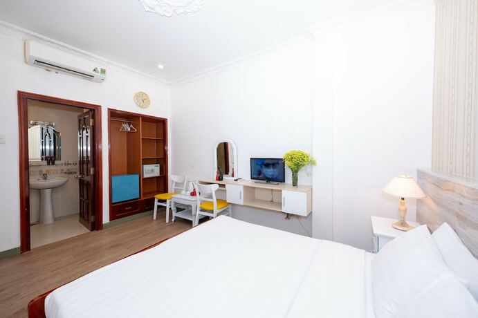 Imagen de la habitación del Hotel The One Ben Thanh. Foto 22