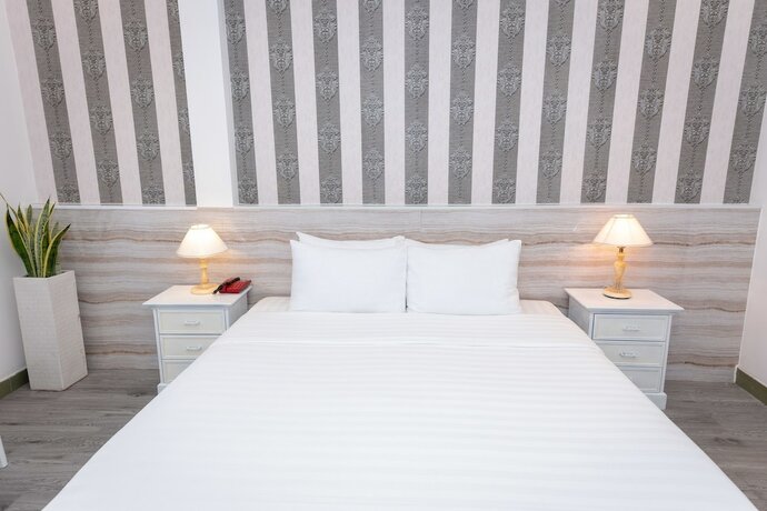 Imagen de la habitación del Hotel The One Ben Thanh. Foto 24