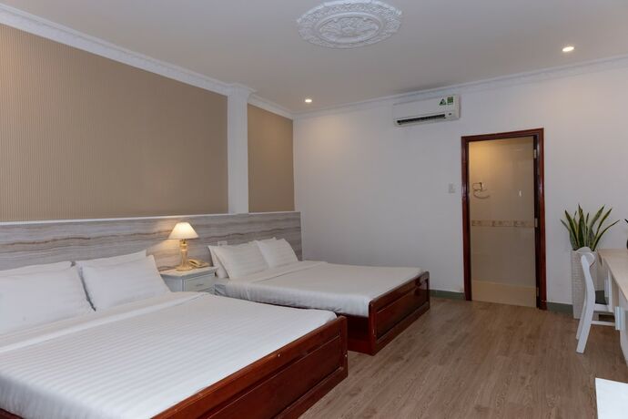 Imagen de la habitación del Hotel The One Ben Thanh. Foto 25