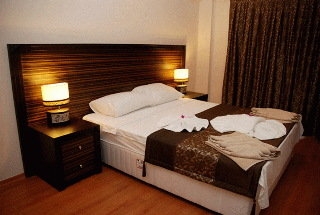 Imagen de la habitación del Hotel The One Club. Foto 5