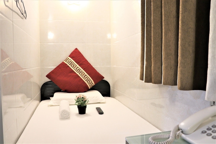 Imagen de la habitación del Hotel The One Inn. Foto 16