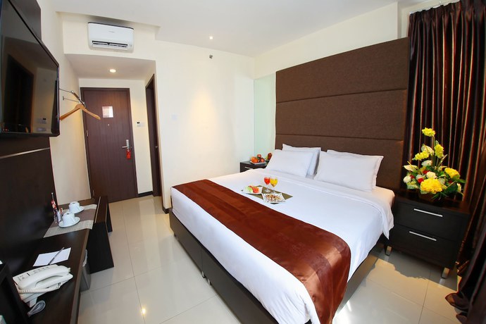 Imagen de la habitación del Hotel The One Makassar. Foto 10