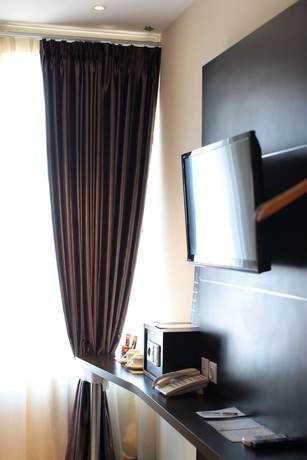 Imagen de la habitación del Hotel The One Makassar. Foto 11