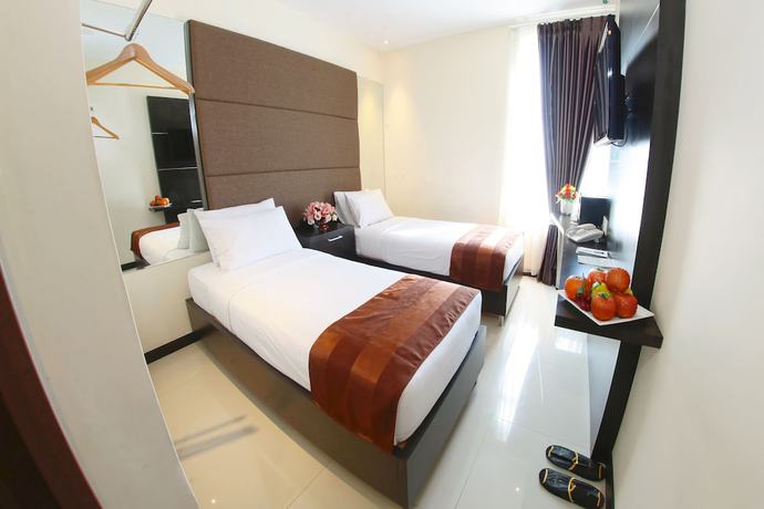 Imagen de la habitación del Hotel The One Makassar. Foto 14