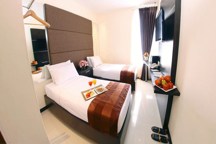Imagen de la habitación del Hotel The One Makassar. Foto 15