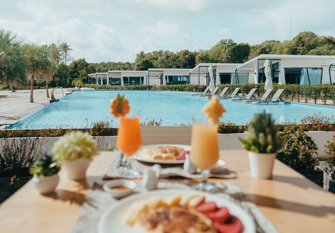 Imagen del bar/restaurante del Hotel The One Resort Koh Rong. Foto 3