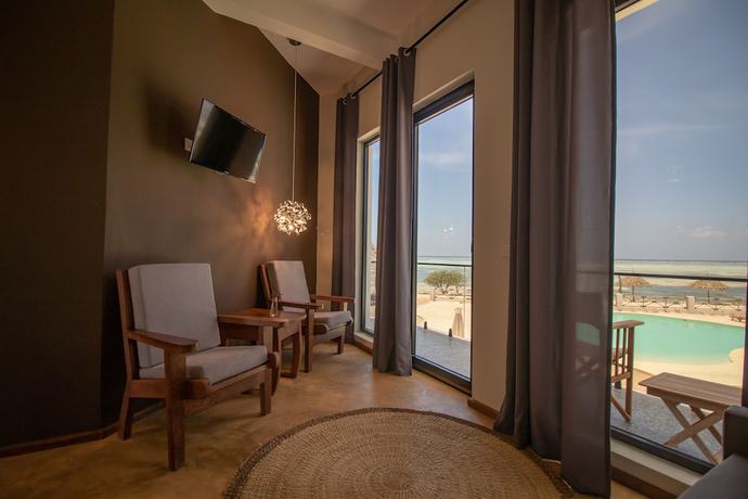 Imagen de la habitación del Hotel The One Resort Zanzibar. Foto 10