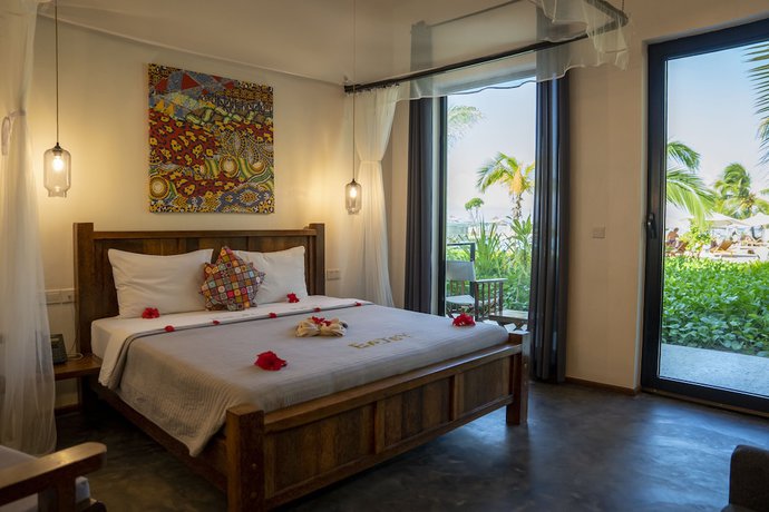 Imagen de la habitación del Hotel The One Resort Zanzibar. Foto 15