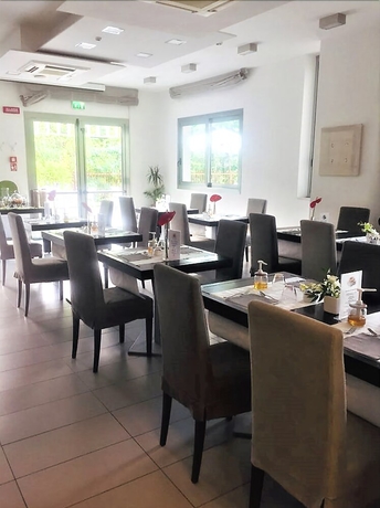 Imagen del bar/restaurante del Hotel The One, Riccione. Foto 3