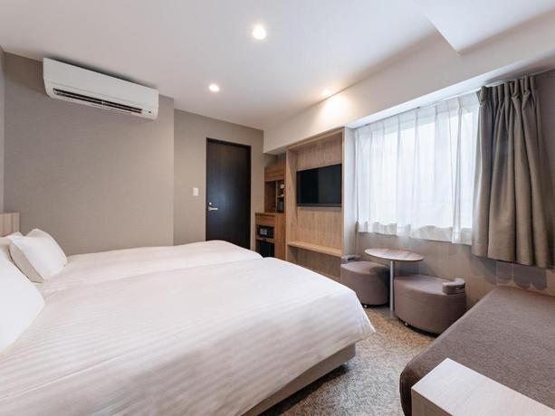 Imagen de la habitación del Hotel The OneFive Osaka Namba Kuromon. Foto 2