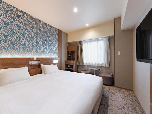 Imagen de la habitación del Hotel The OneFive Osaka Namba Kuromon. Foto 5