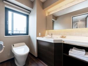 Imagen de la habitación del Hotel The OneFive Osaka Namba Kuromon. Foto 6