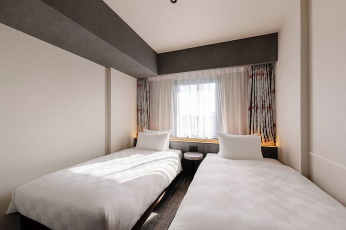Imagen de la habitación del Hotel The OneFive Osaka Shinsekai. Foto 11