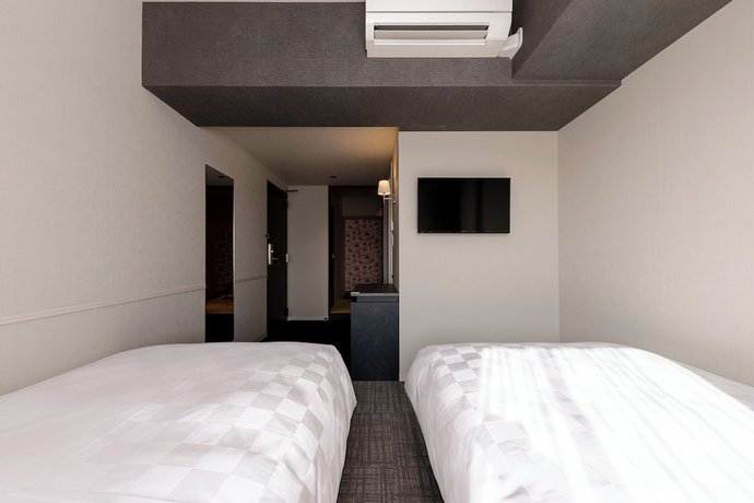 Imagen de la habitación del Hotel The OneFive Osaka Shinsekai. Foto 13