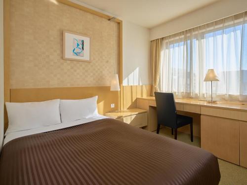 Imagen de la habitación del Hotel The OneFive Tokyo Kameido. Foto 13