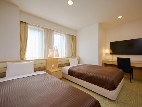 Imagen de la habitación del Hotel The OneFive Tokyo Kameido. Foto 17