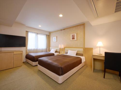 Imagen de la habitación del Hotel The OneFive Tokyo Kameido. Foto 19