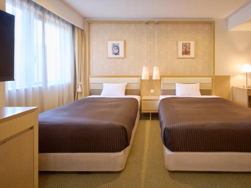 Imagen de la habitación del Hotel The OneFive Tokyo Kameido. Foto 20