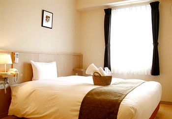 Imagen de la habitación del Hotel The Onefive Osaka Midosuji. Foto 6