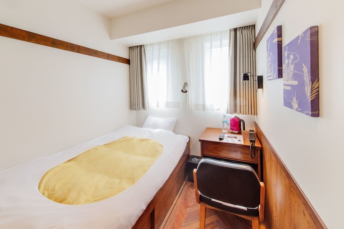 Imagen de la habitación del Hotel The Onefive Tokyo Shibuya. Foto 12