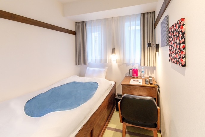 Imagen de la habitación del Hotel The Onefive Tokyo Shibuya. Foto 13