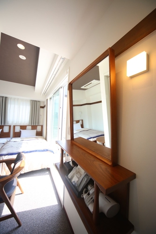 Imagen de la habitación del Hotel The Onefive Tokyo Shibuya. Foto 16