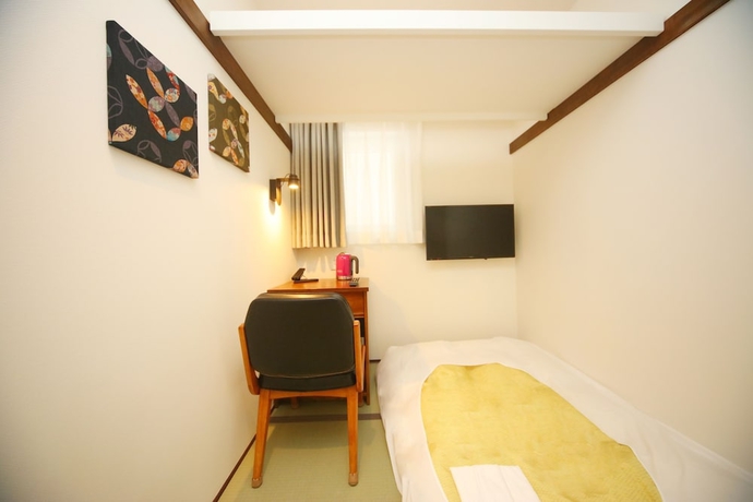 Imagen de la habitación del Hotel The Onefive Tokyo Shibuya. Foto 17