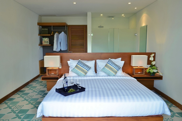 Imagen de la habitación del Hotel The Open House Bali. Foto 8
