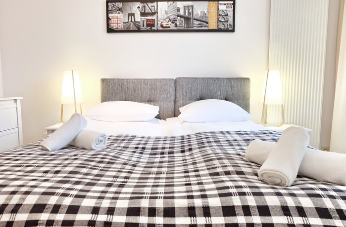 Imagen de la habitación del Hotel The Opera Residence. Foto 11