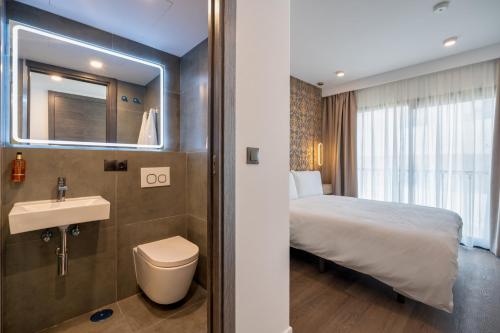 Imagen de la habitación del Hotel The Orange House Boutique. Foto 9