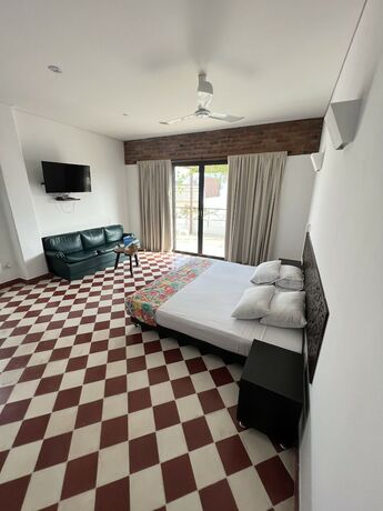 Imagen de la habitación del Hotel The Orange House, Santa Marta. Foto 12