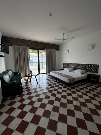 Imagen de la habitación del Hotel The Orange House, Santa Marta. Foto 18