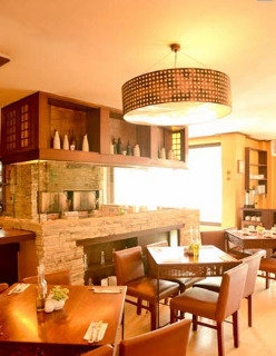 Imagen del bar/restaurante del Hotel The Orange Place San Juan. Foto 6
