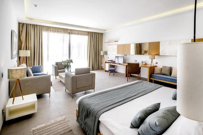 Imagen de la habitación del Hotel The Orangers Garden Villas and Bungalows. Foto 6