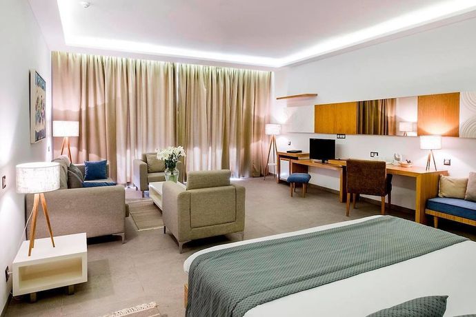 Imagen de la habitación del Hotel The Orangers Garden Villas and Bungalows. Foto 7