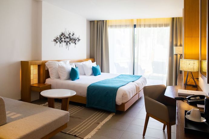 Imagen de la habitación del Hotel The Orangers Garden Villas and Bungalows. Foto 10