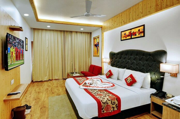 Imagen de la habitación del Hotel The Orchard Greens. Foto 12