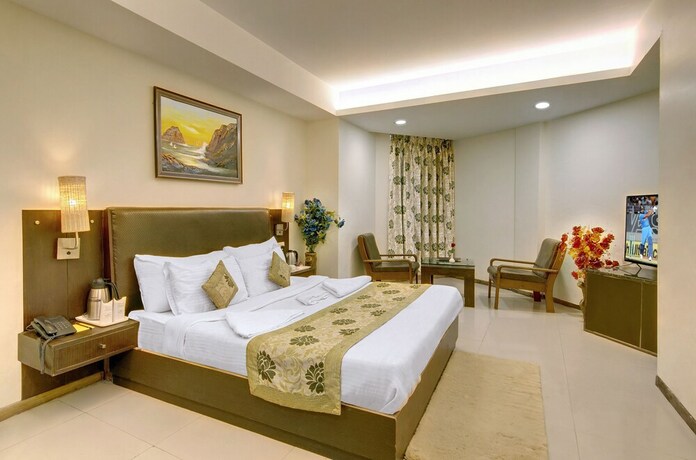Imagen de la habitación del Hotel The Orchard Greens. Foto 19