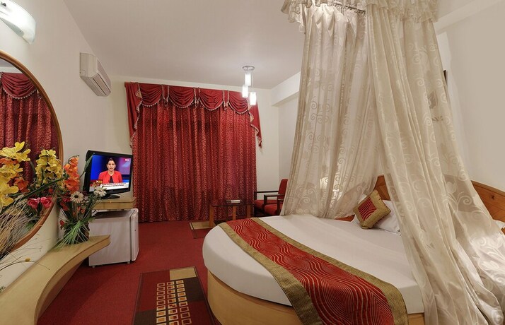 Imagen de la habitación del Hotel The Orchard Greens. Foto 20