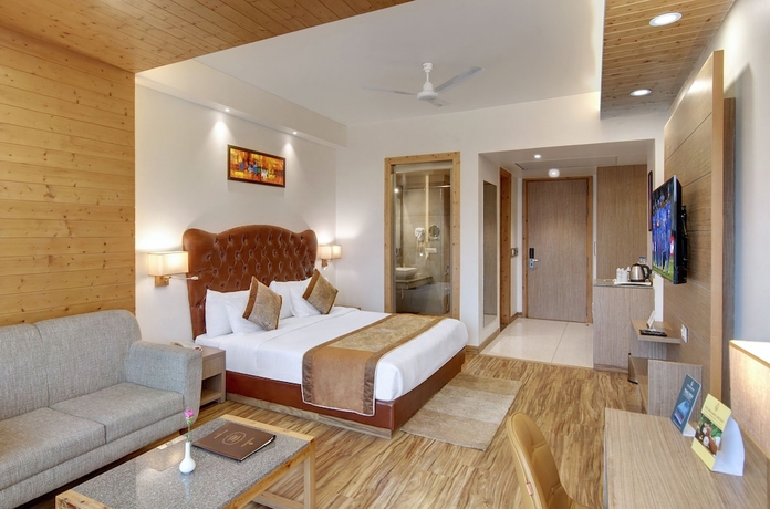 Imagen de la habitación del Hotel The Orchard Greens Resort And Spa. Foto 10