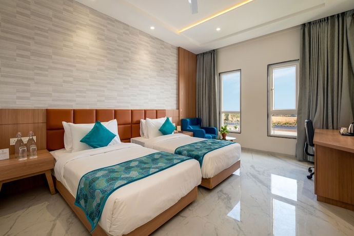 Imagen de la habitación del Hotel The Orchid Jamnagar. Foto 3