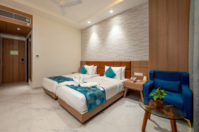 Imagen de la habitación del Hotel The Orchid Jamnagar. Foto 5