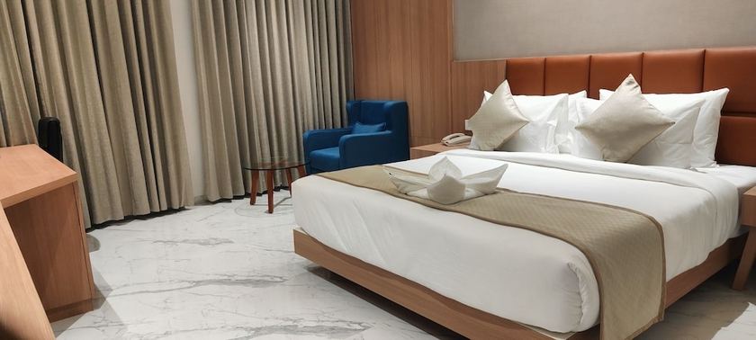 Imagen de la habitación del Hotel The Orchid Jamnagar. Foto 6