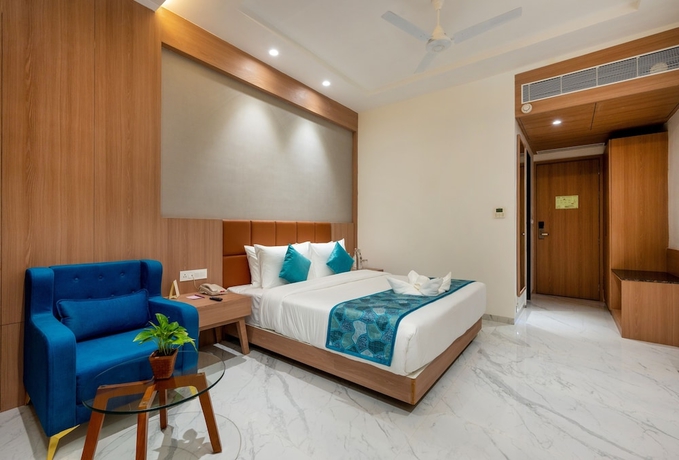 Imagen de la habitación del Hotel The Orchid Jamnagar. Foto 7