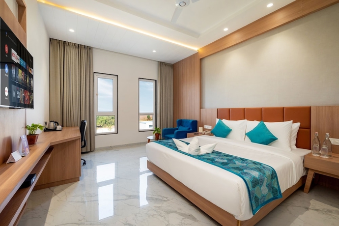 Imagen de la habitación del Hotel The Orchid Jamnagar. Foto 11