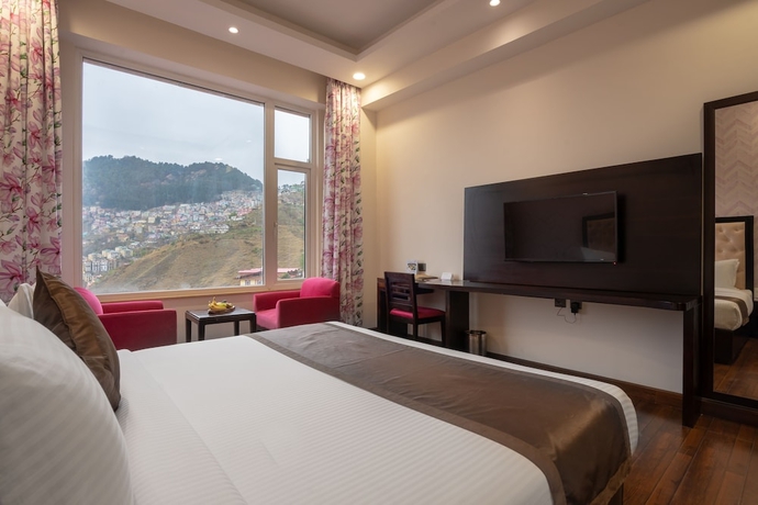 Imagen de la habitación del Hotel The Orchid Shimla. Foto 11